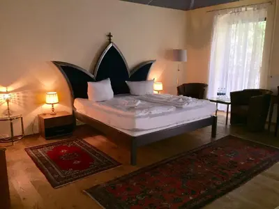 Ein Bett oder Betten in einem Zimmer der Unterkunft Pension Tempelhof