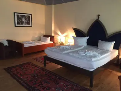 Ein Bett oder Betten in einem Zimmer der Unterkunft Pension Tempelhof