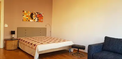 Ein Bett oder Betten in einem Zimmer der Unterkunft Frankfurter Tor