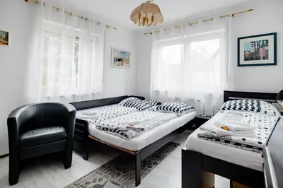 Ein Bett oder Betten in einem Zimmer der Unterkunft Ruhige Zimmer im Grünen