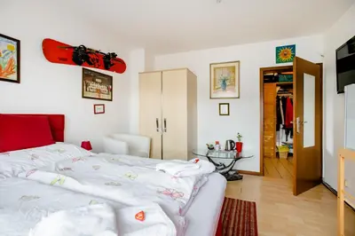 Ein Bett oder Betten in einem Zimmer der Unterkunft Ruhige Zimmer im Grünen