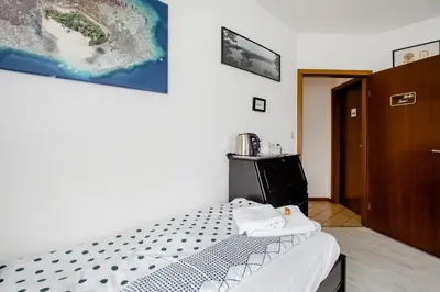 Ein Bett oder Betten in einem Zimmer der Unterkunft Ruhige Zimmer im Grünen