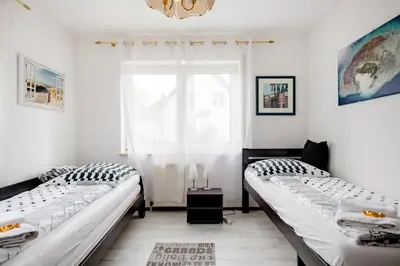 Ein Bett oder Betten in einem Zimmer der Unterkunft Ruhige Zimmer im Grünen