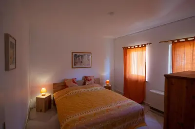 Ein Bett oder Betten in einem Zimmer der Unterkunft Ferienwohnung Sonnenblume Himmelpfort