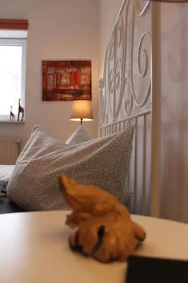 Ein Bett oder Betten in einem Zimmer der Unterkunft OG Die alte Stadtmühle direkt an der Flämingskate