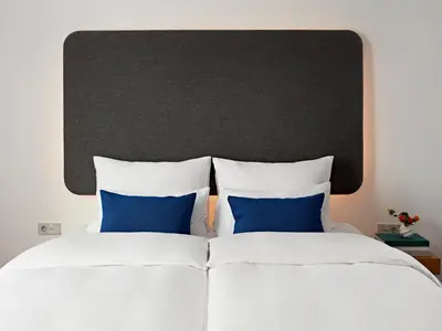 Ein Bett oder Betten in einem Zimmer der Unterkunft Numa Berlin Drift