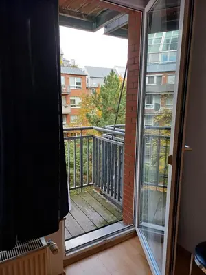 Ein Balkon oder eine Terrasse in der Unterkunft Business Apartment