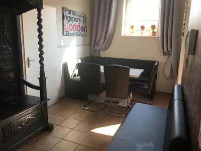 Ein Sitzbereich in der Unterkunft Haus Springpfuhl EG