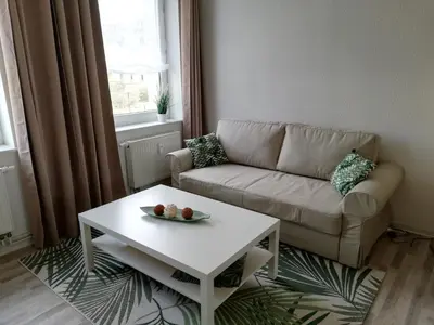 Ein Sitzbereich in der Unterkunft Ferienwohnung mit Seeblick