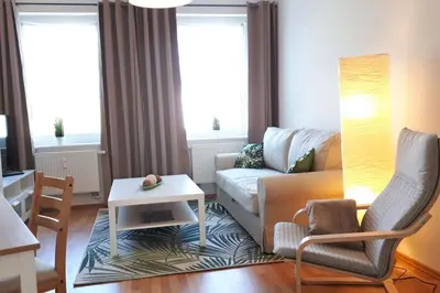 Ein Sitzbereich in der Unterkunft Ferienwohnung mit Seeblick
