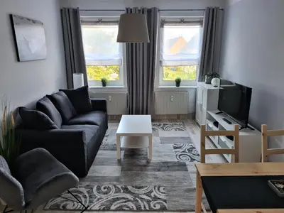 Ein Sitzbereich in der Unterkunft Ferienwohnung mit Seeblick