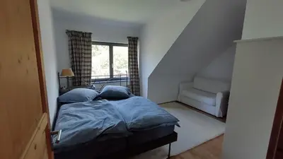 Ein Bett oder Betten in einem Zimmer der Unterkunft Große Ferienwohnung in Peetzig am See
