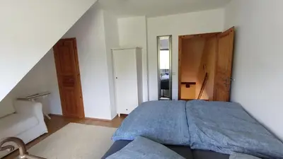 Ein Bett oder Betten in einem Zimmer der Unterkunft Große Ferienwohnung in Peetzig am See