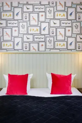 Ein Bett oder Betten in einem Zimmer der Unterkunft Old Town Hotel