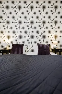 Ein Bett oder Betten in einem Zimmer der Unterkunft Old Town Hotel