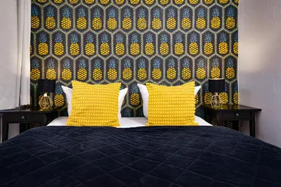 Ein Bett oder Betten in einem Zimmer der Unterkunft Old Town Hotel