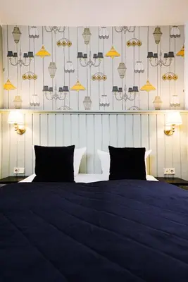 Ein Bett oder Betten in einem Zimmer der Unterkunft Old Town Hotel