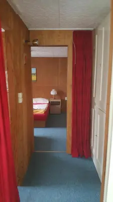 Ein Bett oder Betten in einem Zimmer der Unterkunft Ferienwohnungen am Werbellinsee