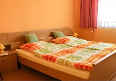 Ein Bett oder Betten in einem Zimmer der Unterkunft Villa Sonnenschein