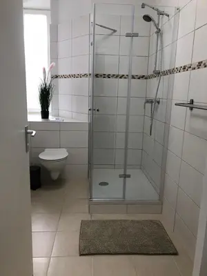 Ein Badezimmer in der Unterkunft Pension Kaffeefreunde