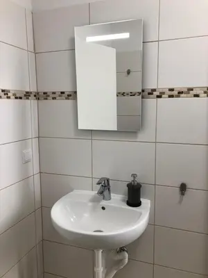 Ein Badezimmer in der Unterkunft Pension Kaffeefreunde