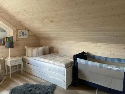 Ein Bett oder Betten in einem Zimmer der Unterkunft Chalet Rotbuche