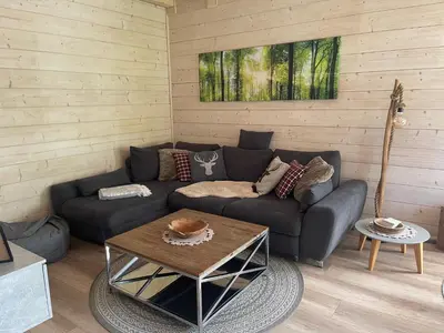 Ein Sitzbereich in der Unterkunft Chalet Rotbuche
