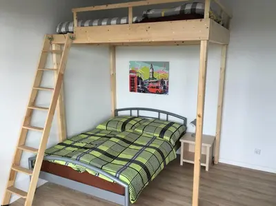 Ein Bett oder Betten in einem Zimmer der Unterkunft Cityflair Apartments