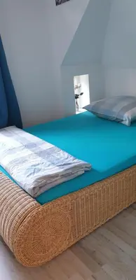Ein Bett oder Betten in einem Zimmer der Unterkunft Zwei Etagen Wohnung im Grünen