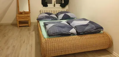 Ein Bett oder Betten in einem Zimmer der Unterkunft Zwei Etagen Wohnung im Grünen