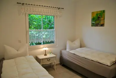 Ein Bett oder Betten in einem Zimmer der Unterkunft Ferienhaus Berlin