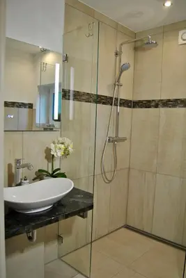 Ein Badezimmer in der Unterkunft Ferienhaus Berlin