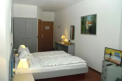 Ein Bett oder Betten in einem Zimmer der Unterkunft Keramik Hotel Rheinsberg