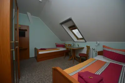 Ein Bett oder Betten in einem Zimmer der Unterkunft Christel's Pension
