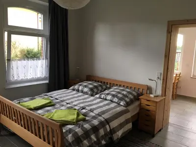 Ein Bett oder Betten in einem Zimmer der Unterkunft Ferienwohnung an der Berliner Seenkette