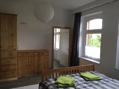 Ein Bett oder Betten in einem Zimmer der Unterkunft Ferienwohnung an der Berliner Seenkette