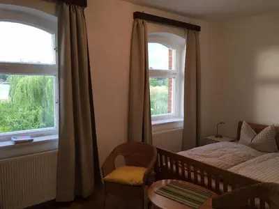 Ein Bett oder Betten in einem Zimmer der Unterkunft Ferienwohnung an der Berliner Seenkette