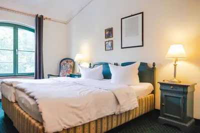 Ein Bett oder Betten in einem Zimmer der Unterkunft Brauhaus in Spandau