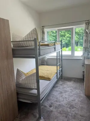 Ein Bett oder Betten in einem Zimmer der Unterkunft App. Weisses Haus