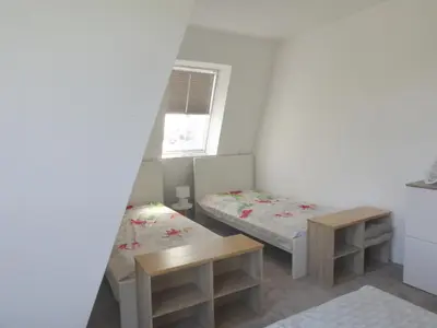 Ein Bett oder Betten in einem Zimmer der Unterkunft App. Weisses Haus