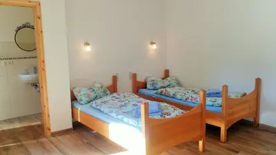 Ein Bett oder Betten in einem Zimmer der Unterkunft Mirabellenhof- Remise