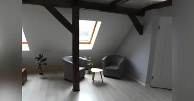 Ein Sitzbereich in der Unterkunft Ferienwohnung Olafs Werkstatt