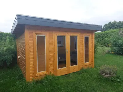 Ein Garten an der Unterkunft Ferienhaus zum Imker