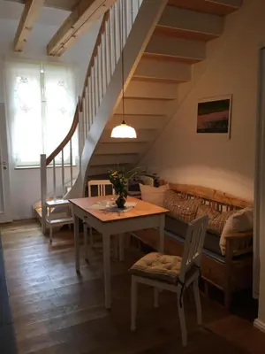 Ein Sitzbereich in der Unterkunft Ferienwohnung Kamp `Himmelsblick` mit Schlafgalerie