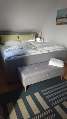 Ein Bett oder Betten in einem Zimmer der Unterkunft Klimatisiertes Ferienapartment an der Stadtgrenze von Berlin