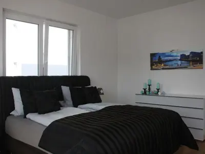 Ein Bett oder Betten in einem Zimmer der Unterkunft Zum großen Zernsee am Hafen