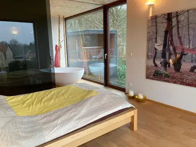 Ein Bett oder Betten in einem Zimmer der Unterkunft Poolvilla