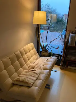 Ein Sitzbereich in der Unterkunft Poolvilla
