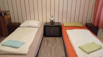 Ein Bett oder Betten in einem Zimmer der Unterkunft Gästewohnung Locktow, Hauptstraße 1