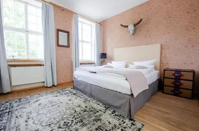 Ein Bett oder Betten in einem Zimmer der Unterkunft Design Apartments - 